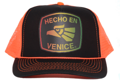 HECHO EN VENICE RASTA NEON TRUCKER HAT